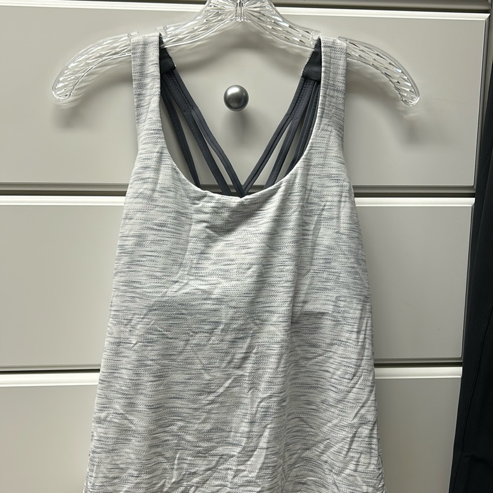 Lulu lemon size 12 sports bra and tank top.